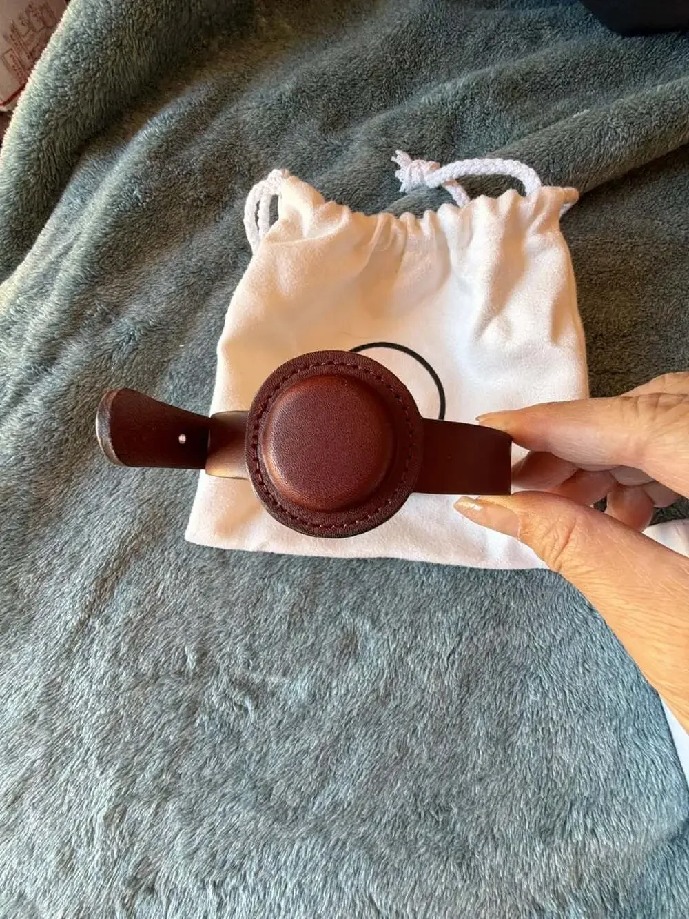 TagLock Leather AirTag Collar Holder Brown with a TrackR bravo device